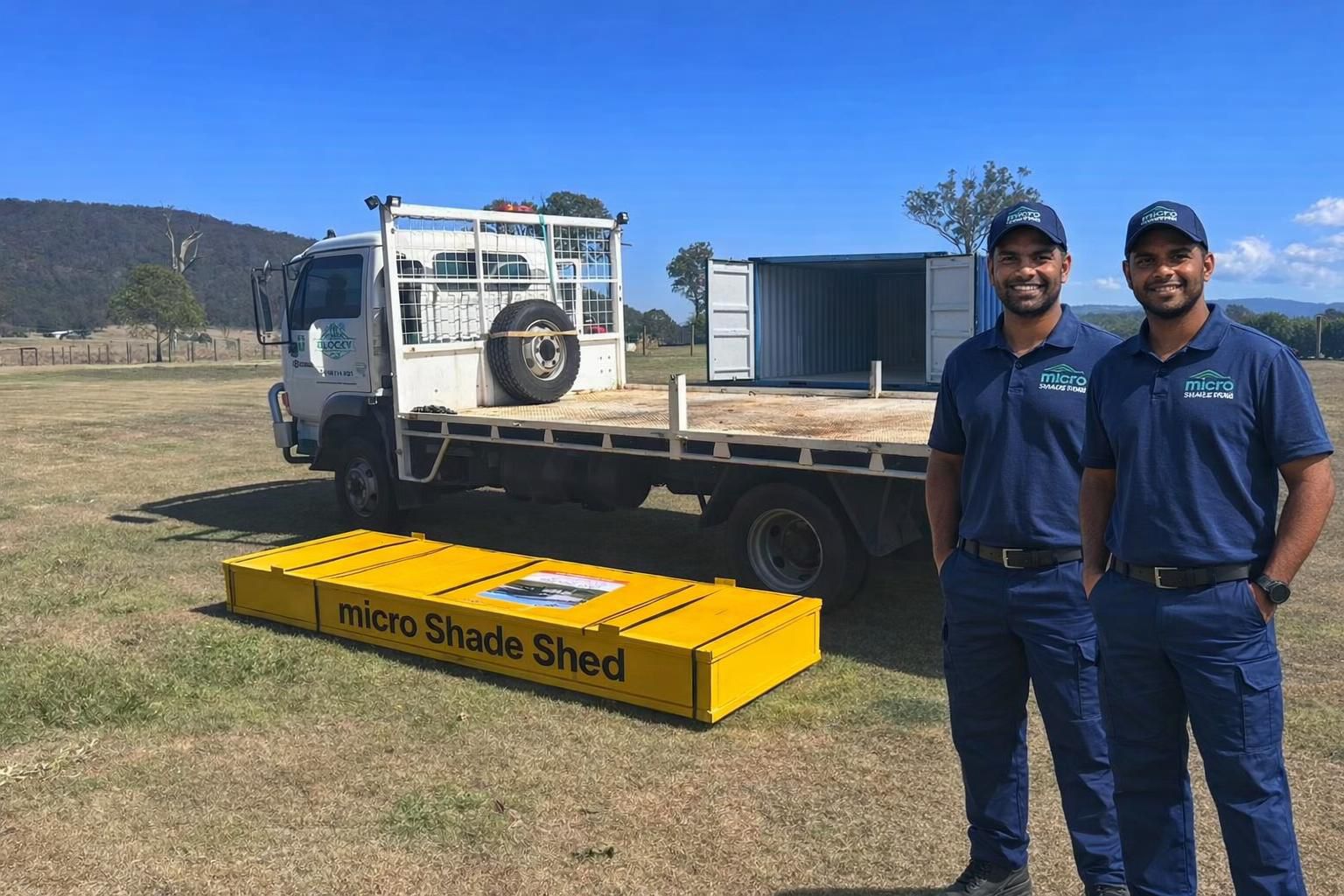 Micro Shade Sheds business operators with truck and stocked kit ready for work